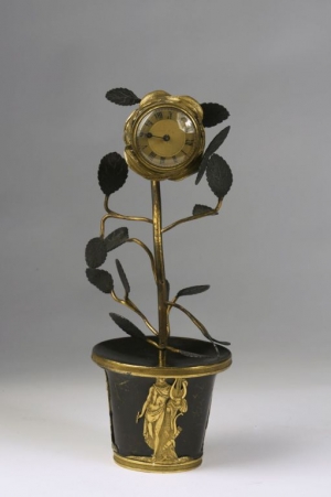 An Empire Gilt and Patinated Bronze Clock